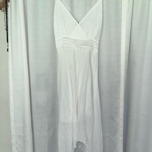 white sundress with asymmetrical bottom